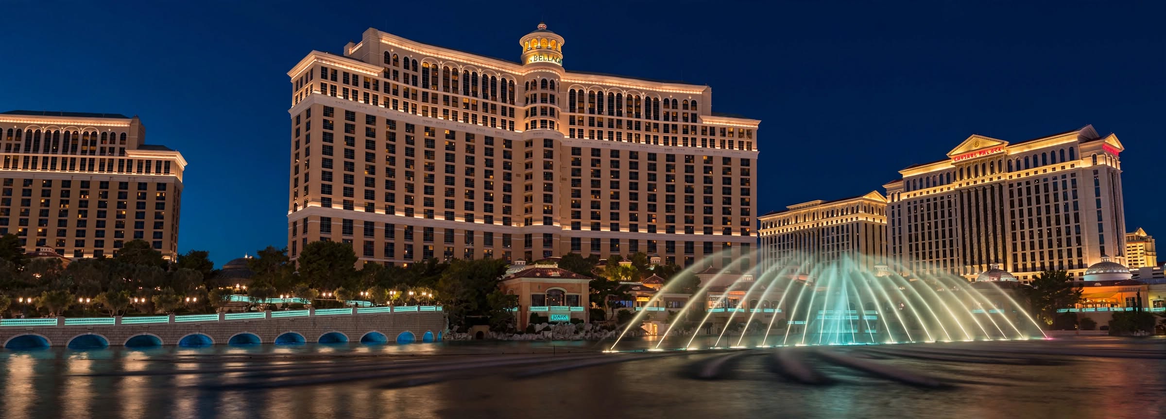 Bellagio resort illuminated lake and grand facade in Las Vegas